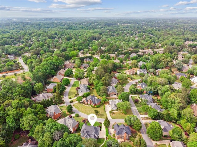 bird's eye view with a view of trees and a residential view