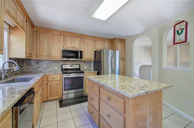 108 Arbor Hills Trl, Talking Rock, GA 30175 - kitchen with decorative backsplash, appliances with stainless steel finishes, light stone counters, and a sink