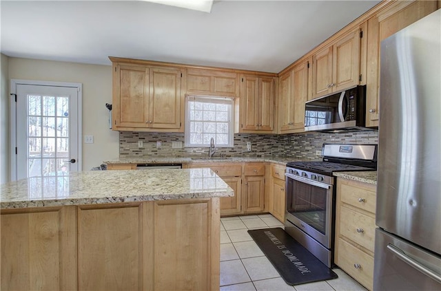 108 Arbor Hills Trl, Talking Rock, GA 30175 - kitchen featuring light brown cabinets, appliances with stainless steel finishes, decorative backsplash, and a sink