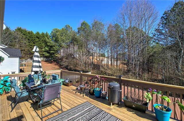 108 Arbor Hills Trl, Talking Rock, GA 30175 - wooden terrace with outdoor dining space and a grill