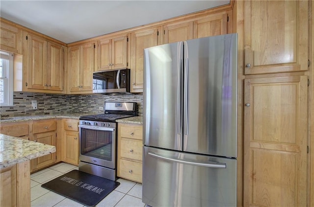 108 Arbor Hills Trl, Talking Rock, GA 30175 - kitchen featuring light tile patterned floors, appliances with stainless steel finishes, decorative backsplash, and light stone counters