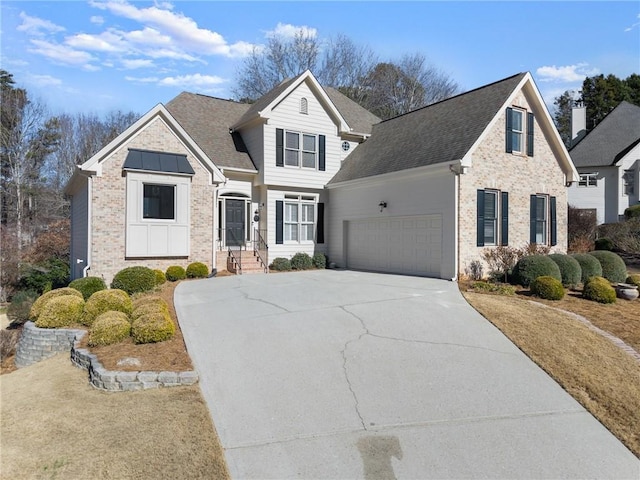 front of property with a garage