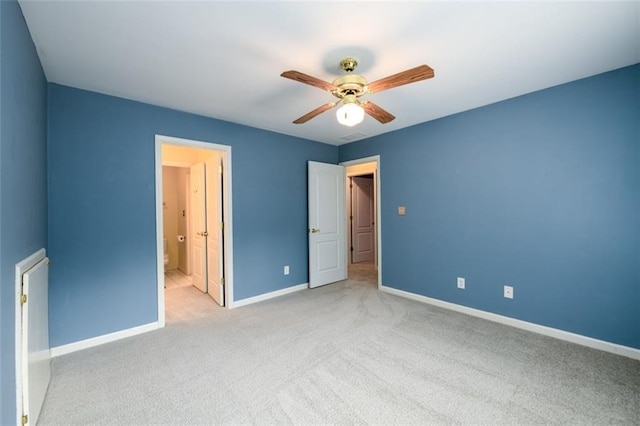 unfurnished bedroom featuring carpet flooring, baseboards, and ceiling fan