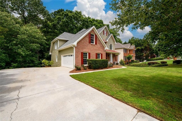view of front facade featuring brick siding, a front yard, concrete driveway, and a garage