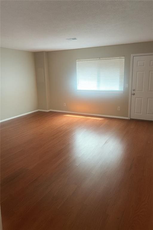 5581 Marbut Rd, Lithonia, GA 30058 - spare room featuring wood finished floors