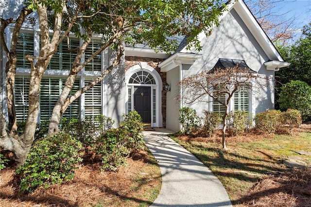 view of front of property featuring stucco siding