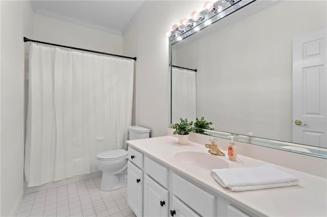 bathroom with vanity, toilet, crown molding, and tile patterned flooring