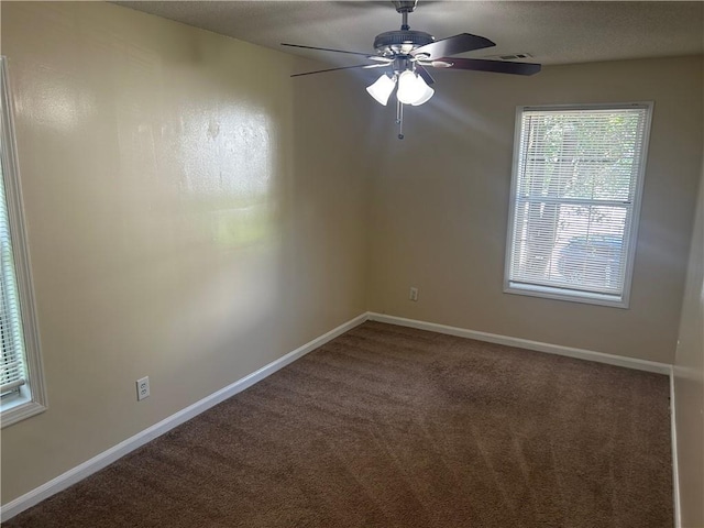5000 Saxony Ct, Stone Mountain, GA 30083 - carpeted spare room featuring ceiling fan and baseboards