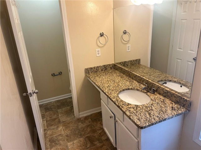 5000 Saxony Ct, Stone Mountain, GA 30083 - bathroom with vanity and stone finish floors