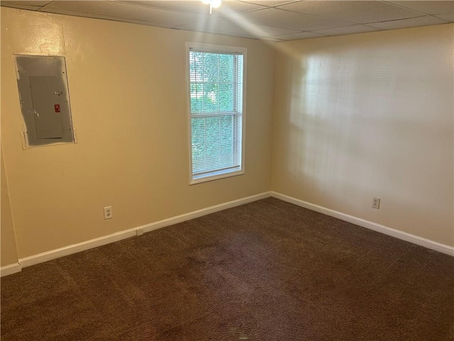 5000 Saxony Ct, Stone Mountain, GA 30083 - empty room with electric panel and dark colored carpet
