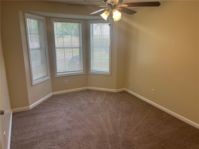 5000 Saxony Ct, Stone Mountain, GA 30083 - carpeted spare room featuring baseboards and a ceiling fan