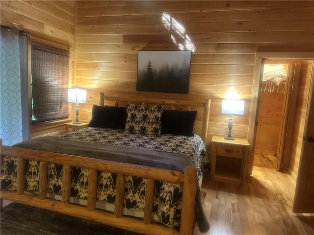 105 Ranch Mountain Ct, Dahlonega, GA 30533 - bedroom featuring wood-type flooring and wooden walls