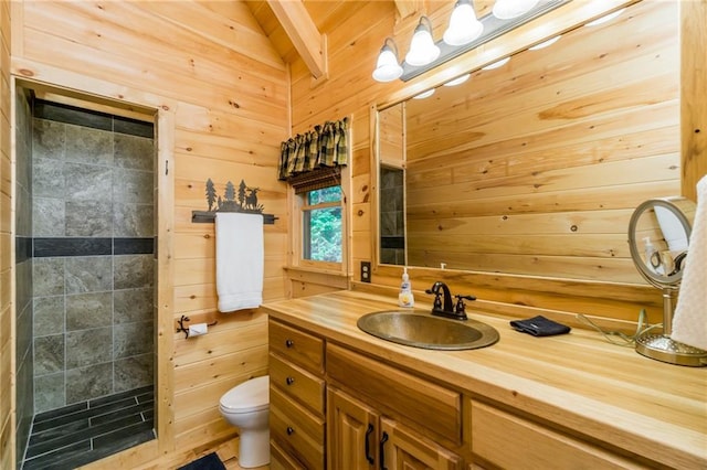 105 Ranch Mountain Ct, Dahlonega, GA 30533 - bathroom with toilet, vanity, wooden walls, and a tile shower