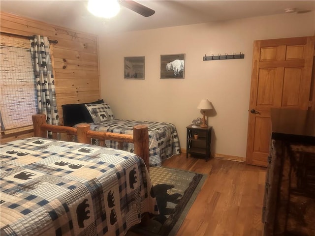 105 Ranch Mountain Ct, Dahlonega, GA 30533 - bedroom with light wood-type flooring and ceiling fan