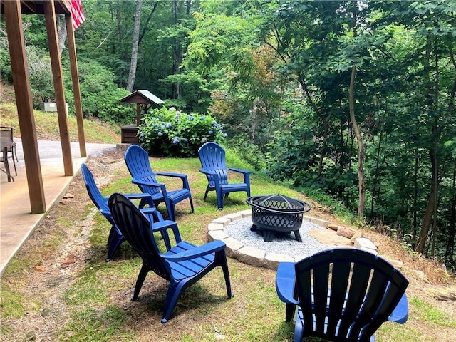 105 Ranch Mountain Ct, Dahlonega, GA 30533 - view of yard with a fire pit, a forest view, and a patio area