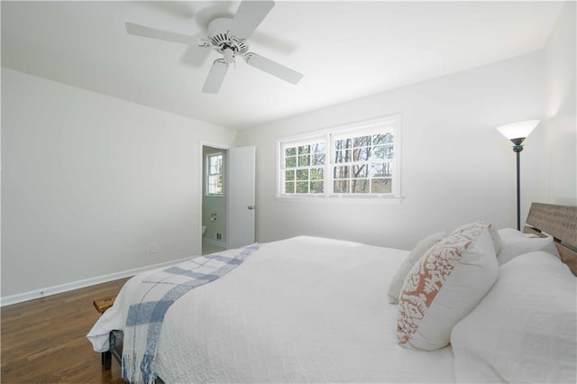 bedroom with ceiling fan, wood finished floors, and baseboards