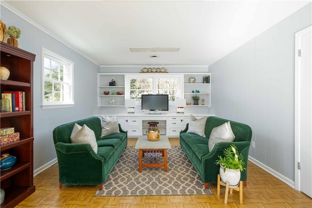 living room with baseboards and crown molding