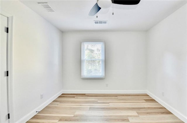 2502 Tupelo St SE, Atlanta, GA 30317 - spare room featuring a ceiling fan, light wood-type flooring, and baseboards