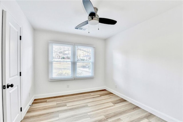 2502 Tupelo St SE, Atlanta, GA 30317 - unfurnished bedroom featuring light wood-type flooring, baseboards, and ceiling fan