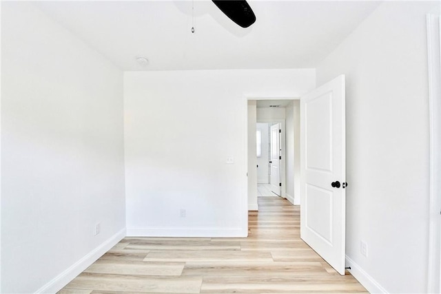 2502 Tupelo St SE, Atlanta, GA 30317 - empty room featuring ceiling fan, light wood finished floors, and baseboards