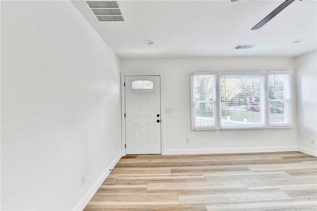2502 Tupelo St SE, Atlanta, GA 30317 - foyer entrance featuring light wood-style floors, a ceiling fan, and baseboards