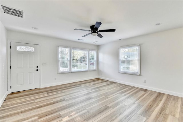 2502 Tupelo St SE, Atlanta, GA 30317 - entrance foyer featuring light wood finished floors, baseboards, and a ceiling fan