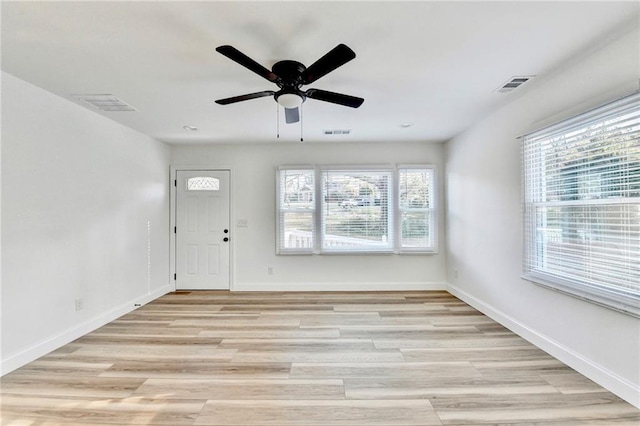 2502 Tupelo St SE, Atlanta, GA 30317 - entryway featuring healthy amount of natural light, light wood-type flooring, and baseboards
