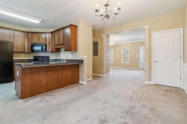 kitchen featuring kitchen peninsula, hanging light fixtures, light colored carpet, and black appliances