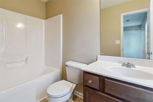 full bathroom with shower / bathing tub combination, vanity, and toilet