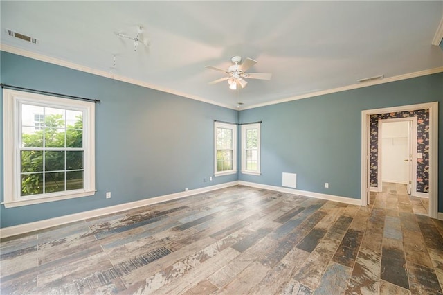 6065 Standard View Dr, Duluth, GA 30097 - spare room with ceiling fan, healthy amount of natural light, baseboards, crown molding, and wood finished floors