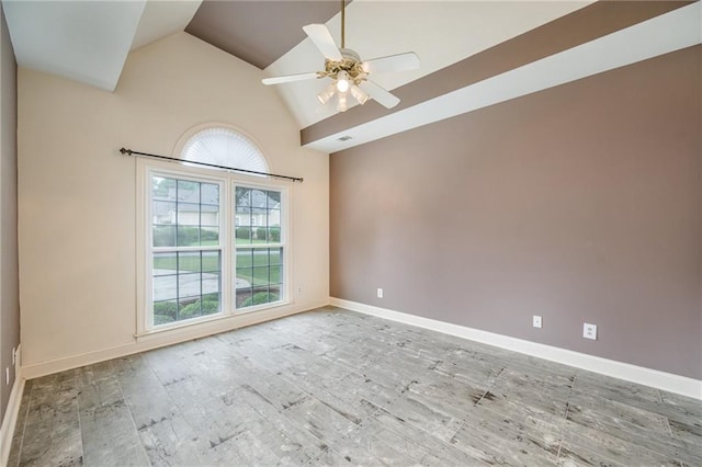6065 Standard View Dr, Duluth, GA 30097 - unfurnished room featuring wood finished floors, baseboards, ceiling fan, and high vaulted ceiling