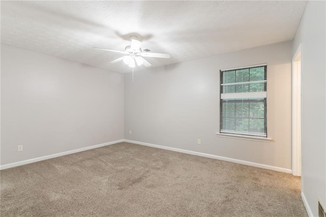 5218 Tina Ct, Stone Mountain, GA 30083 - unfurnished room featuring carpet floors, ceiling fan, and baseboards