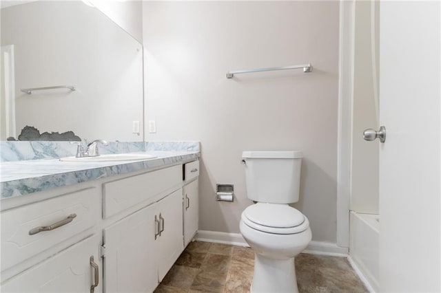 5218 Tina Ct, Stone Mountain, GA 30083 - full bath featuring vanity, toilet, and baseboards