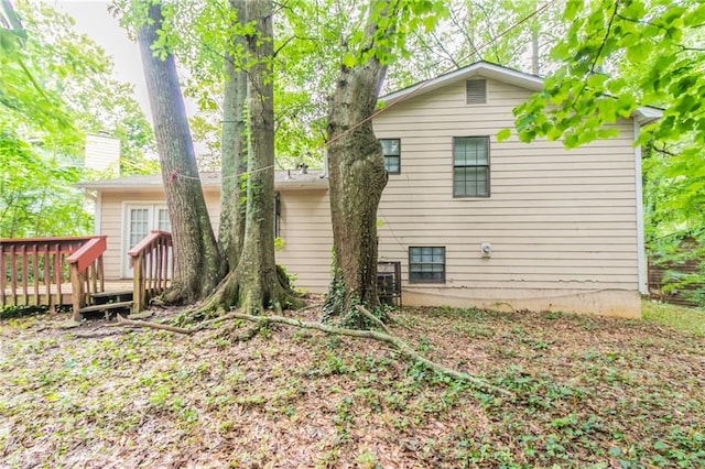 5218 Tina Ct, Stone Mountain, GA 30083 - back of property featuring a wooden deck