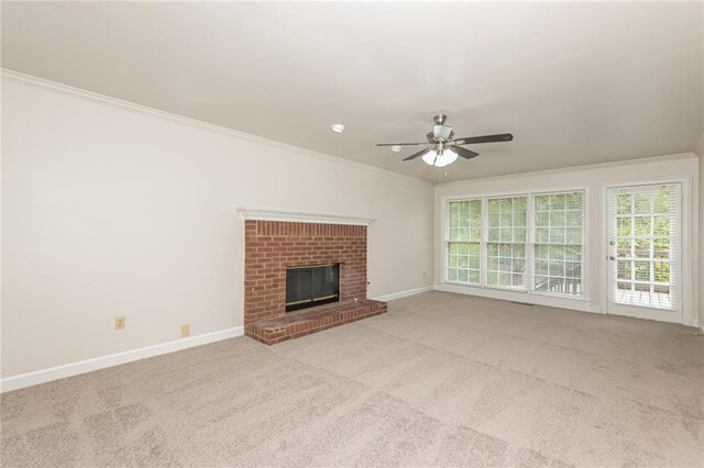 unfurnished living room with light carpet and crown molding