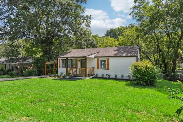 single story home with a front yard