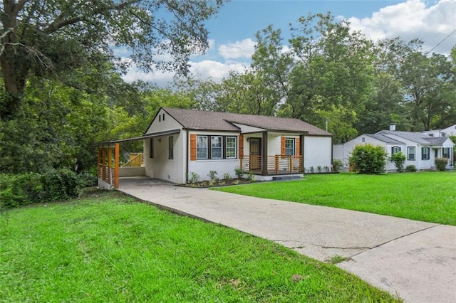 single story home with a carport and a front yard