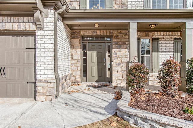 property entrance with a garage