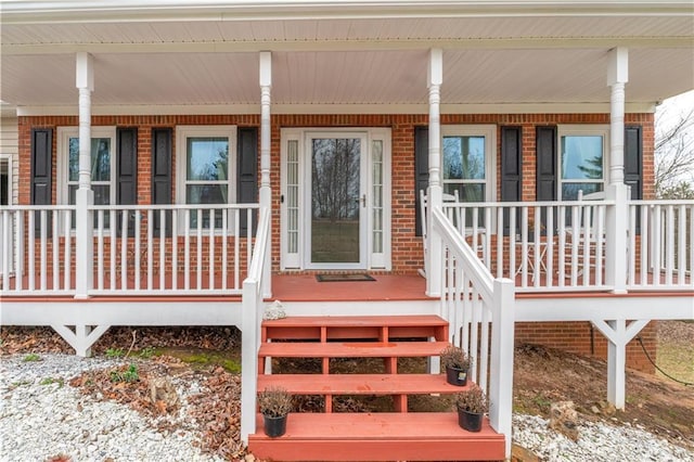 doorway to property with covered porch