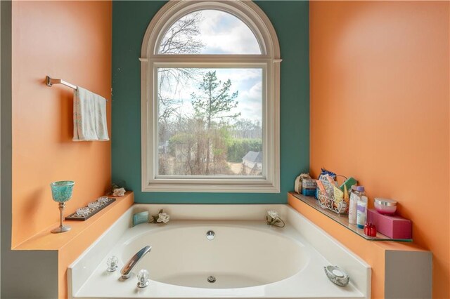 bathroom with a washtub