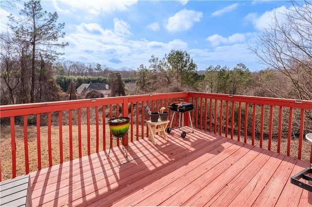 deck featuring a grill