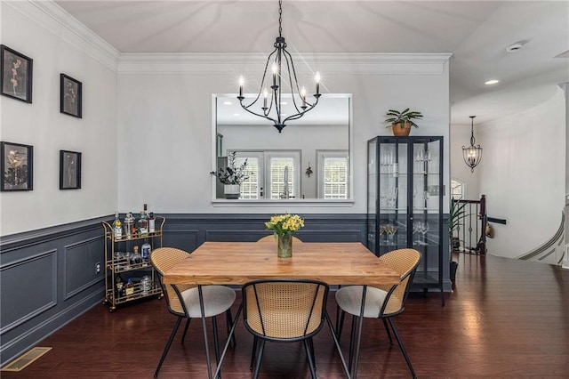 1012 E Paces Chase, Atlanta, GA 30326 - dining area featuring a chandelier, dark wood-type flooring, crown molding, wainscoting, and recessed lighting