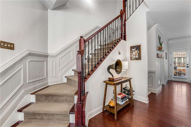 1012 E Paces Chase, Atlanta, GA 30326 - stairs featuring a decorative wall, wood finished floors, crown molding, and a wainscoted wall