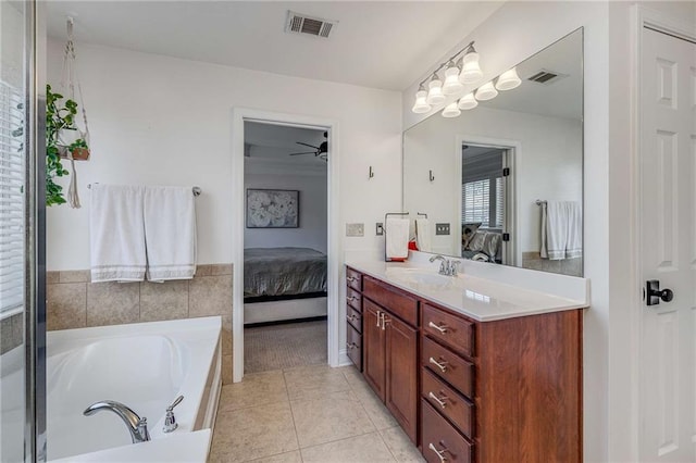 1012 E Paces Chase, Atlanta, GA 30326 - ensuite bathroom with vanity, a bath, tile patterned flooring, and ceiling fan