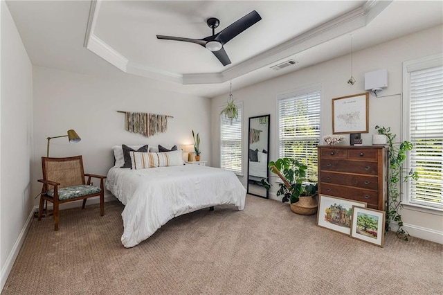 1012 E Paces Chase, Atlanta, GA 30326 - carpeted bedroom featuring a raised ceiling, crown molding, baseboards, and ceiling fan