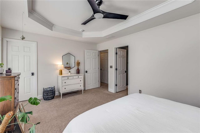 1012 E Paces Chase, Atlanta, GA 30326 - carpeted bedroom featuring a tray ceiling, ornamental molding, baseboards, and ceiling fan