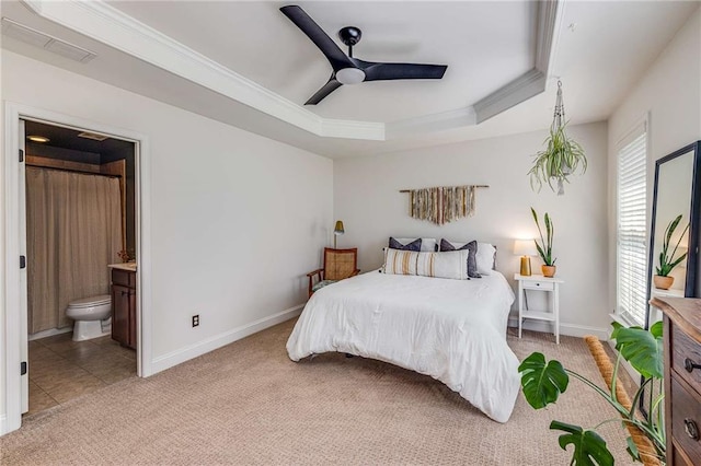 1012 E Paces Chase, Atlanta, GA 30326 - bedroom with light carpet, ornamental molding, baseboards, a raised ceiling, and connected bathroom