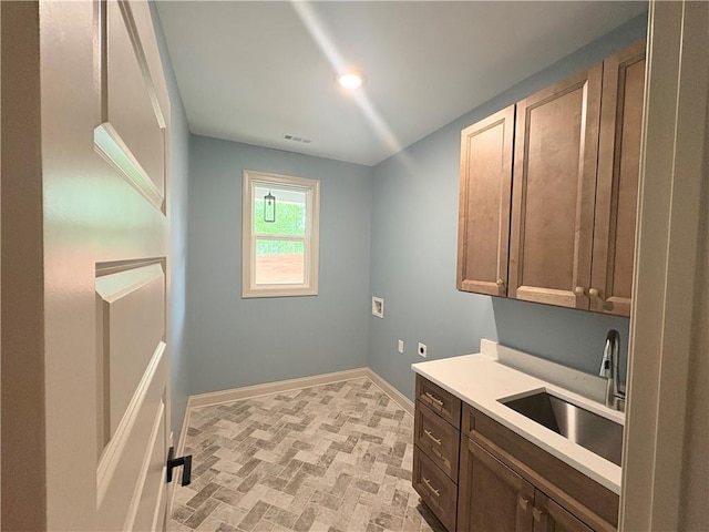 4786 Conns Creek Rd, Ball Ground, GA 30107 - washroom with cabinet space, electric dryer hookup, brick patterned floors, and washer hookup