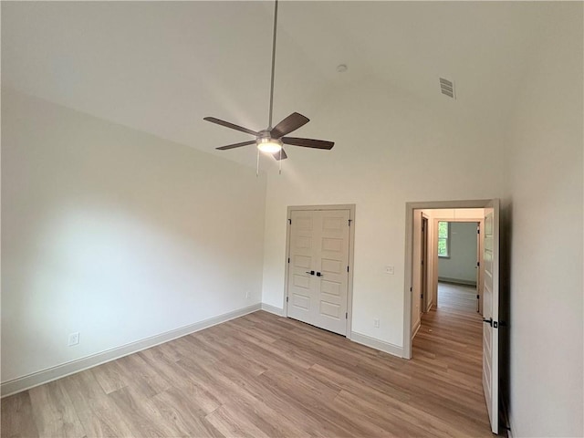 4786 Conns Creek Rd, Ball Ground, GA 30107 - unfurnished room with high vaulted ceiling, ceiling fan, and light wood-type flooring