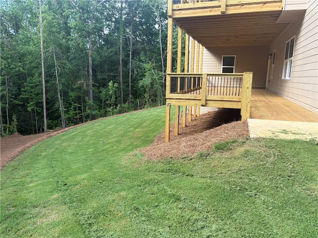 4786 Conns Creek Rd, Ball Ground, GA 30107 - view of grassy yard with a forest view and a wooden deck